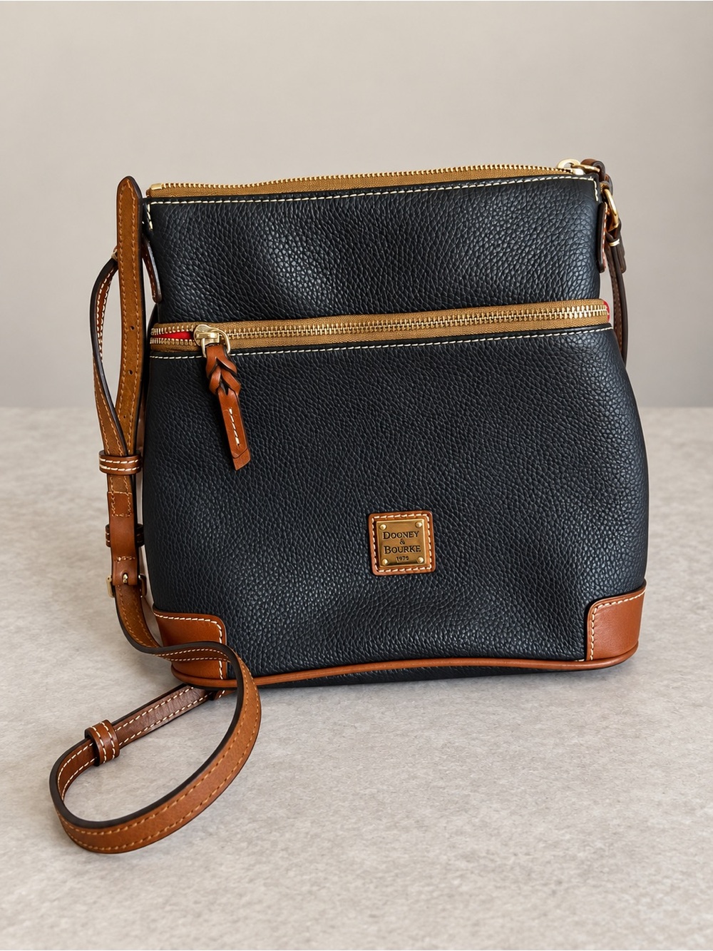 Dooney & Bourke Black and Brown Pebbled Leather Crossbody